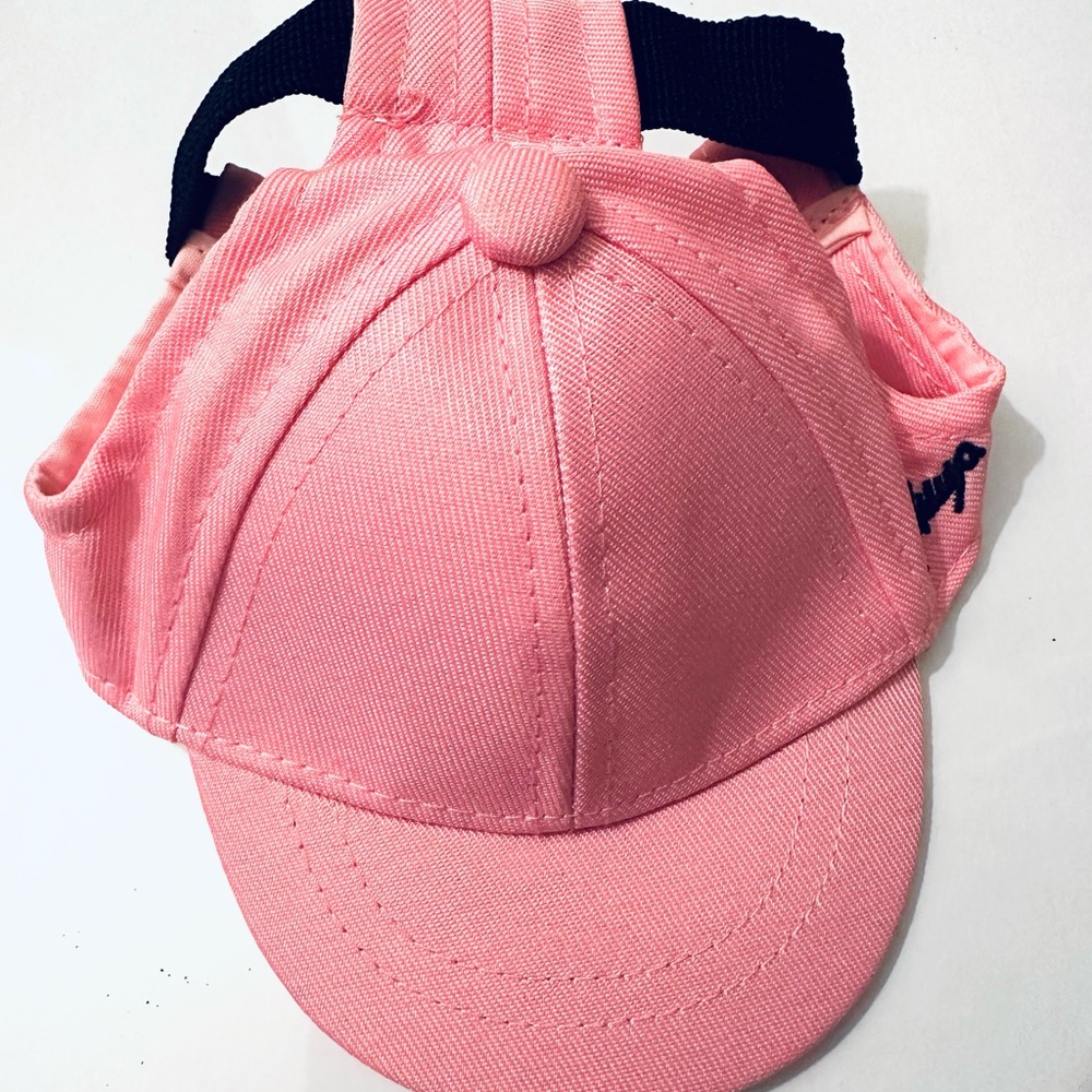 Doggy Baseball Cap. Pink With ear holes and adjustable strap.